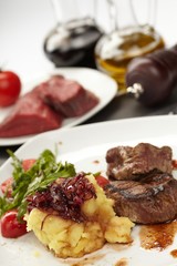 Beef steaks with vegetables