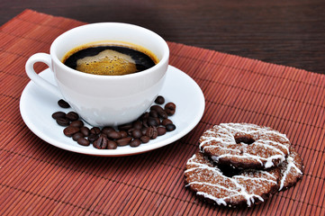 Cup of coffee with cookies