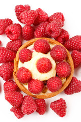 Cake with raspberry on white background