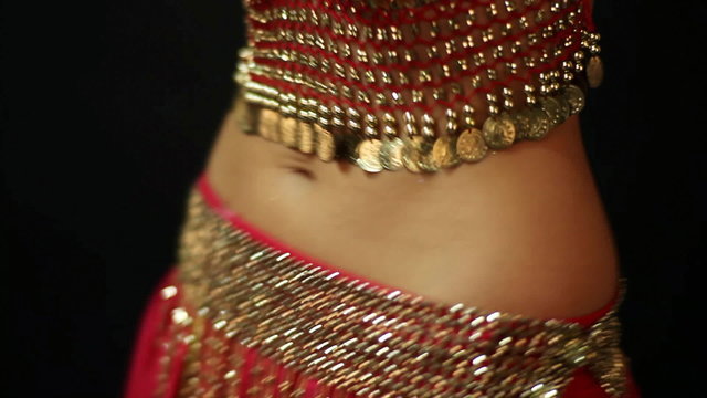 Belly dance, close up.