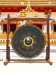 brown gong of thai temple in wat background