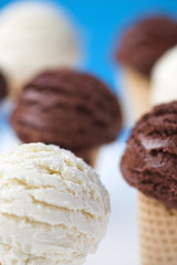 Ice cream cones - organic vanilla & chocolate. Shallow dof