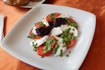 Tomatos and cheeses