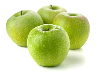 Four ripe green apples