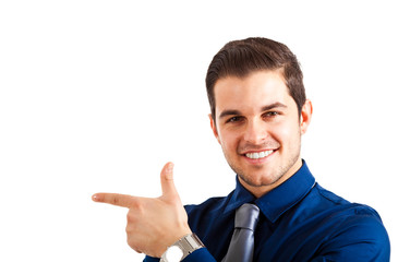 Young businessman pointing to something using a finger