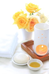 Aroma oil and candle with towel