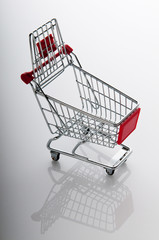 Shopping cart against the  background