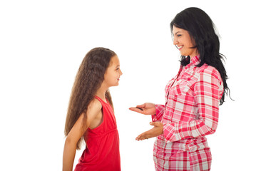 Mother having conversation with daughter