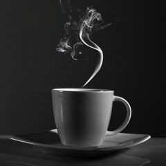 cup of black coffee on dark background