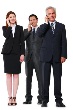 two businessman and one businesswoman with mobile