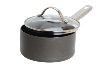 Saucepan with glass lid on white