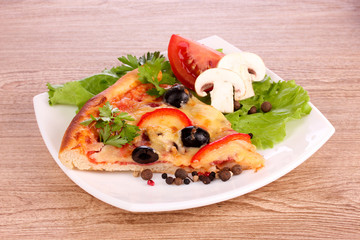 tasty pizza with olives on a wooden background