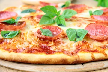 Foto op Aluminium Fresh hot pepperoni pizza - closeup © Olga Kriger