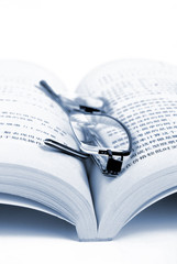 Book,glasses and pencil