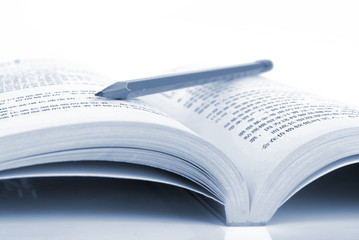 Obraz premium Book and pencil