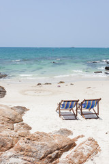 beach chair on white sand