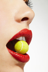 lips bitting sugar tennis ball