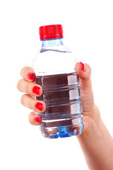 woman's hand and bottle of water isolated on white