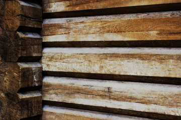 Grungy wooden wall made of logs