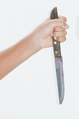Knife in hand.