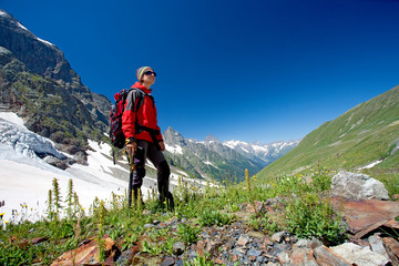 Hiker in Caucasus mountains