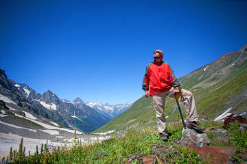 Naklejka na ściany i meble Hiker in Caucasus mountains