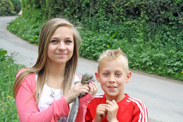 Fototapeta premium children holding squirel