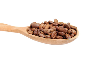 Coffee beans in wooden spoon, isolated on a white background