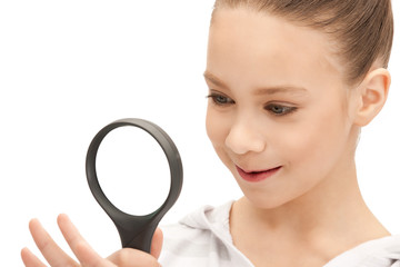 teenage girl with magnifying glass