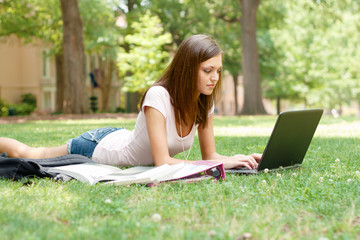 A pretty young student with study materials