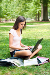 A pretty young student with study materials