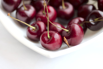 plate with cherry closeup
