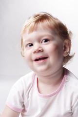 Naklejka premium happy baby on gray background