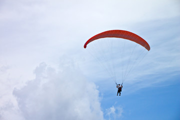 Parachute in blue sky