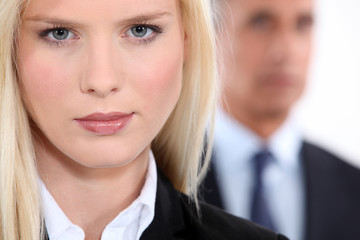 Pretty blonde woman in a suit