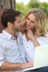 man and woman in a park