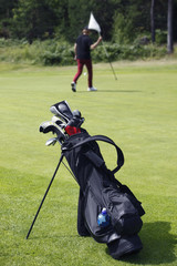 Player in the background holding the flag.