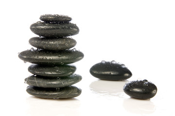 wet zen stones isolated over a  white background.