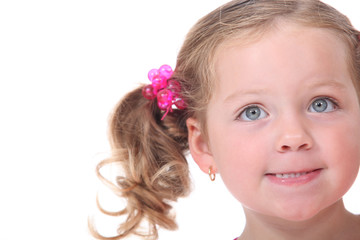 Obraz na płótnie Canvas Little girl with pigtails
