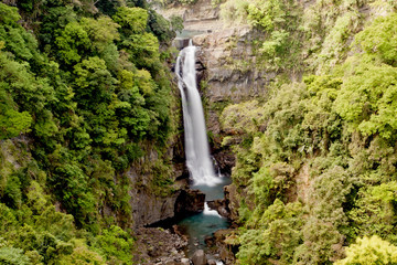 Fototapeta na wymiar a landscape with waterfall