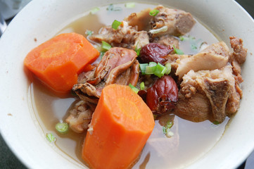image of carrot soup with pork meat