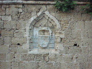 Rhodes Castle wall and heraldry