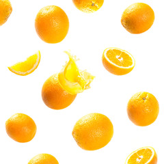 falling and exploding ripe oranges