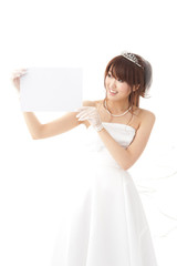 beautiful asian bride holding a blank whiteboard