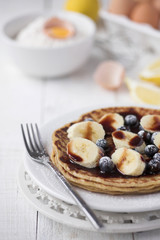 Freshly prepared crepes with banana & chocolate sauce