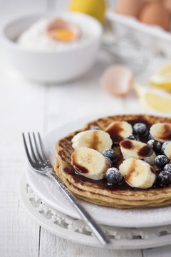 Freshly prepared crepes with banana & chocolate sauce