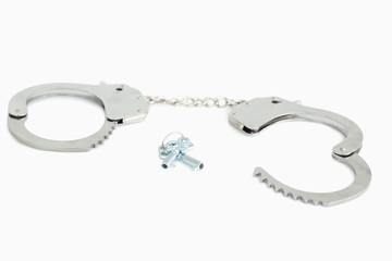 Opened handcuffs and keys