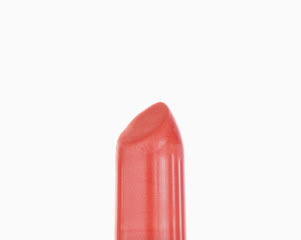 Close up of a pale red lipstick