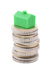 House on the top of the euro coins with clipping path