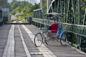 Tricycle in old bridge